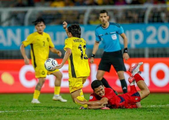 July 28, 2026, Kuala Lumpur, Malaysia: Aliff Haiqal Bin Lokman Hakim Lau of Malaysia (L) seen in action during the ASEAN Hyundai Cup 2026 match between Malaysia and Laos at Kuala Lumpur Football Stadium, Cheras. Final score; Malaysia 4:0 Laos. Kuala Lumpur Malaysia - ZUMAs197 20260728_aaa_s197_312 Copyright: xWongxFokxLoyx