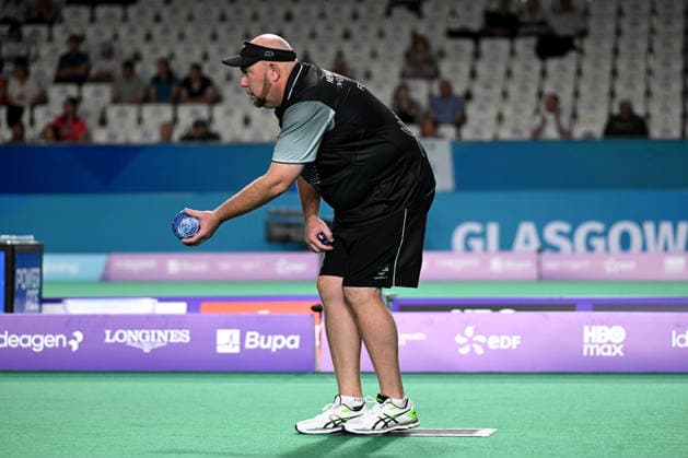 COM26 BOWLS, Ali Forsyth of New Zealand prepares to bowl during the Men™s Pairs Bowls during the Glasgow 2026 Commonwealth Games at SEC Centre Hall 3 in Glasgow, Scotland, Thursday, July 23, 2026. ( NO ARCHIVING, EDITORIAL USE ONLY Glasgow Scotland United Kingdom  Copyright: xLUKASxCOCHx 20260729119251821749