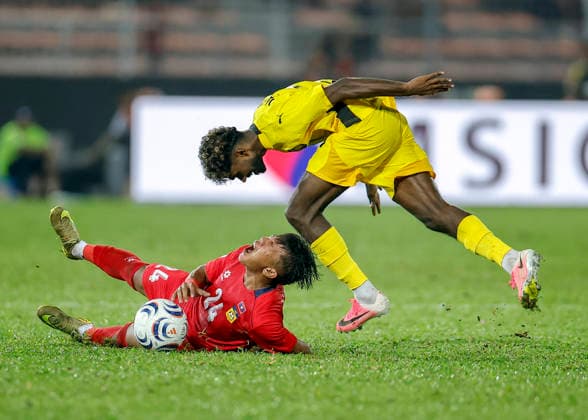 July 28, 2026, Kuala Lumpur, Malaysia: Pavithran Gunalan of Malaysia (R) and Vilay Kulungsy of Laos seen in action during the ASEAN Hyundai Cup 2026 match between Malaysia and Laos at Kuala Lumpur Football Stadium, Cheras. Final score; Malaysia 4:0 Laos. ASEAN Hyundai Cup 2026 Malaysia Vs Laos In Kuala Lumpur, Malaysia - 28 Jul 2026  - ZUMAs197 20260728_aaa_s197_324 Copyright: xWongxFokxLoyx