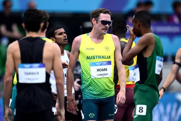 COM26 ATHLETICS, Oliver Hoare of Australia (centre) reacts after falling in the Men™s One Mile, Round 1 heats during the Glasgow 2026 Commonwealth Games at EDF Scotstoun Stadium in Glasgow, Scotland, Wednesday, July 29, 2026. ( NO ARCHIVING, EDITORIAL USE ONLY Glasgow United Kingdom  Copyright: xJOELxCARRETTx 20260729167774583504