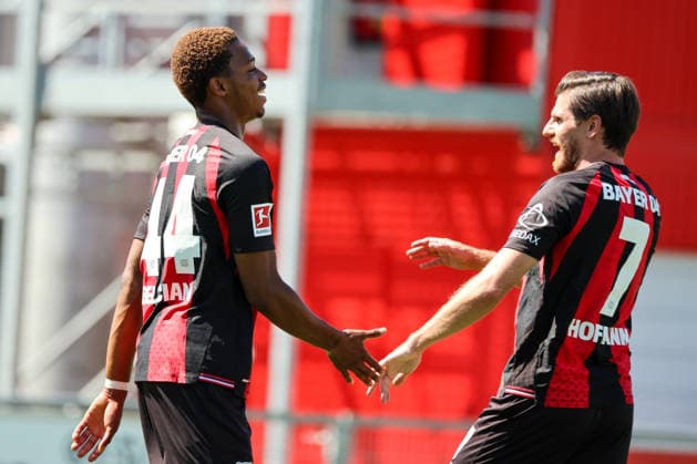 Leverkusen, Deutschland: 28.07.2026 - Testspiel - Bayer 04 Leverkusen vs. KRC Genk Im Bild: v.li. Torschütze Jeanuel Belocian (Leverkusen) macht das Tor zum 1:0 für Leverkusen und jubelt mit Jonas Hofmann (Leverkusen) (DFL DFB REGULATIONS PROHIBIT ANY USE OF PHOTOGRAPHS as IMAGE SEQUENCES and or QUASI-VIDEO) *** *** Leverkusen, Germany, July 28, 2026, Friendly Match: Bayer 04 Leverkusen vs. KRC Genk. Pictured from left: Goal scorer Jeanuel Belocian of Leverkusen scores the 1–0 goal for Leverkusen and celebrates with Jonas Hofmann. Leverkusen. DFL and DFB regulations prohibit ANY USE OF PHOTOGRAPHS AS IMAGE SEQUENCES AND OR QUASI-VIDEO *** Copyright: HMBxMedia MadeleinexFantini