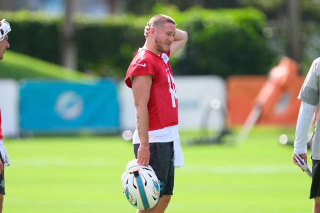 MIAMI GARDENS, FL - JULY 29: Miami Dolphins quarterback Quinn Ewers (14) rubs his head during the Miami Dolphins Training Camp on August 29, 2026, at the Baptist Health Training Complex in Miami Gardens, FL. (Photo by Doug Murray Icon Sportswire) NFL, American Football Herren, USA JUL 29 Dolphins Training Camp EDITORIAL USE ONLY Icon796260729036