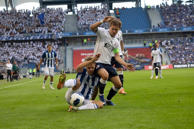 Lech Poznan - Aarhus FC 29.07.2026 football, Poznan , UEFA Champions League Second qualifying round (pilka nozna, Liga Mistrzow, kwalifikacje, runda kwalifikacyjna mecz) game match Lech Poznan - Aarhus FC image shows: Michal Gurgul (L) Kristian Arnstad (R) photo Katarzyna Plewczynska Fotostyk Copyright: xKatarzynaxPlewczynska Fotostykx 20260729KAPL7797