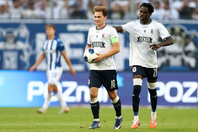 Lech Poznan V Aarhus GF - UEFA Champions League 2026 2027 Second Qualifying Round Second Leg Kristian Arnstad and James Bogere during the UEFA Champions League 2026 2027 Second Qualifying Round Second Leg match between Lech Poznan and Aarhus GF at Enea Stadium in Poznan, Poland, on July 29, 2026. Poznan Poland  Copyright: xPiotrxMatusewiczx originalFilename:matusewicz-lechpozn260729_npM7M.jpg