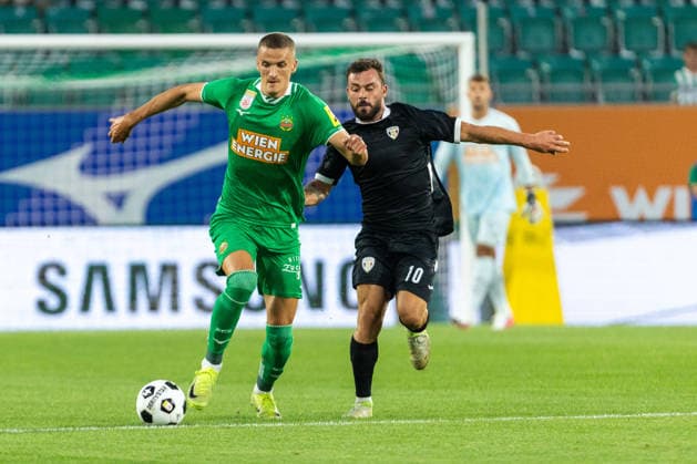 SOCCER - UEFA ECL, Rapid vs Coloma VIENNA,AUSTRIA,29.JUL.26 - SOCCER - UEFA Conference League, qualification, SK Rapid Wien vs FC Santa Coloma. Image shows Nenad Cvetkovic (Rapid) and Guillaume Lopez (Coloma).  GEPAxpictures xPhilippxBrem