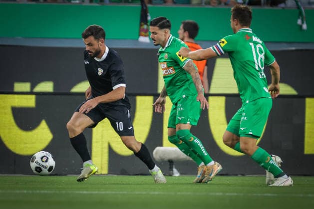 SOCCER - UEFA ECL, Rapid vs Coloma VIENNA,AUSTRIA,29.JUL.26 - SOCCER - UEFA Conference League, qualification, SK Rapid Wien vs FC Santa Coloma. Image shows Guillaume Lopez (Coloma) and Marco Tilio (Rapid).  GEPAxpictures xDavidxBitzan