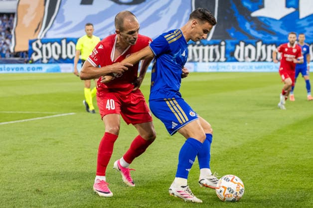 Giorgi Kobuladze of Iberia 1999 Tbilisi and Artur Gajdos of SK Slovan Bratislava seen during UEFA Champions league second qualifying round game between teams of SK Slovan Bratislava and Iberia 1999 Tbilisi (Dominika Kortvelyesiova Ball Raw Images) Bratislava Tehelne Pole stadium Slovakia Copyright: xDominikaxKortvelyesiovax DKOR8551