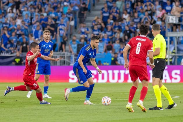 Aleksandre Amisulashvili of Iberia 1999 Tbilisi and Mykola Kukharevych of SK Slovan Bratislava seen during UEFA Champions league second qualifying round game between teams of SK Slovan Bratislava and Iberia 1999 Tbilisi (Dominika Kortvelyesiova Ball Raw Images) Bratislava Tehelne Pole stadium Slovakia Copyright: xDominikaxKortvelyesiovax DKR_1088