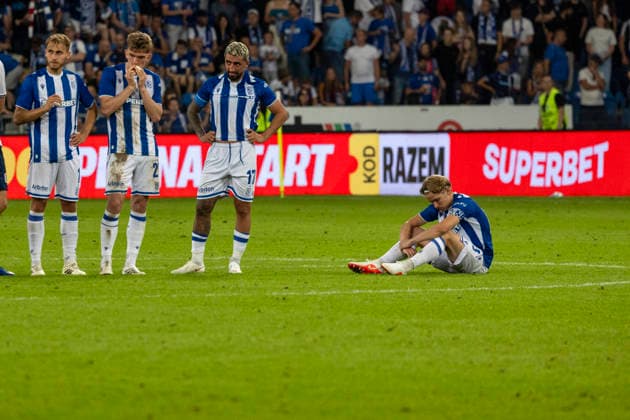 Lech Poznan - Aarhus FC 29.07.2026 football, Poznan , UEFA Champions League Second qualifying round (pilka nozna, Liga Mistrzow, kwalifikacje, runda kwalifikacyjna mecz) game match Lech Poznan - Aarhus FC image shows: Lech Poznan lost the game, Allahyar Sayyademanesh (17) Antoni Kozubal (R) Michal Gurgul (L) photo Katarzyna Plewczynska Fotostyk Copyright: xKatarzynaxPlewczynska Fotostykx 20260729KAPL8626