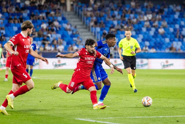 Cesar Blackman of SK Slovan Bratislava and Zviad Natchkhebia of Iberia 1999 Tbilisi seen during UEFA Champions league second qualifying round game between teams of SK Slovan Bratislava and Iberia 1999 Tbilisi (Dominika Kortvelyesiova Ball Raw Images) Bratislava Tehelne Pole stadium Slovakia Copyright: xDominikaxKortvelyesiovax DKOR8715