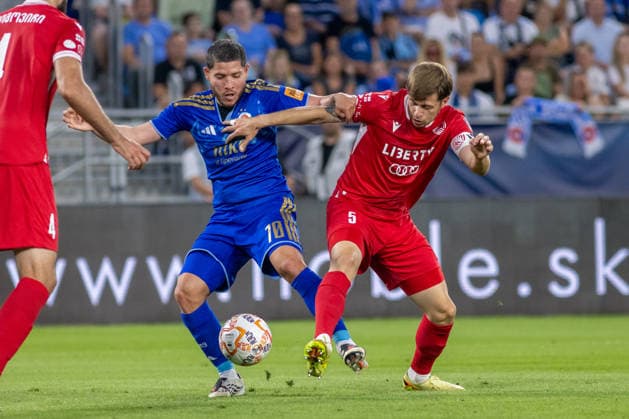 Cristian Martinez of SK Slovan Bratislava and Jemal-Giorgi Jinjolava of Iberia 1999 Tbilisi seen during UEFA Champions league second qualifying round game between teams of SK Slovan Bratislava and Iberia 1999 Tbilisi (Dominika Kortvelyesiova Ball Raw Images) Bratislava Tehelne Pole stadium Slovakia Copyright: xDominikaxKortvelyesiovax DKR_1123