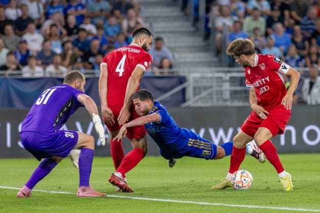 Giorgi Makaridze of Iberia 1999 Tbilisi, Vahid Selimovic of Iberia 1999 Tbilisi, Cristian Martinez of SK Slovan Bratislava and Jemal-Giorgi Jinjolava of Iberia 1999 Tbilisi seen during UEFA Champions league second qualifying round game between teams of SK Slovan Bratislava and Iberia 1999 Tbilisi (Dominika Kortvelyesiova Ball Raw Images) Bratislava Tehelne Pole stadium Slovakia Copyright: xDominikaxKortvelyesiovax DKR_1130