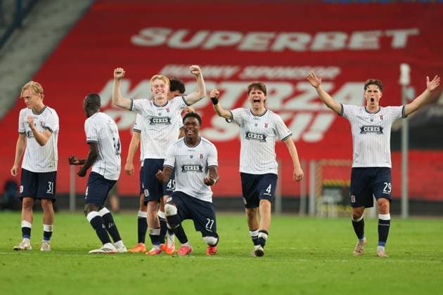 Aarhus GF players celebrate after Janni Serra of Aarhus GF scores his team s goal in the penalty shootout Lech Poznan v Aarhus GF, UEFA Champions League Second Round Qualifier Second Leg, Football, Enea Stadion, Poznan, Poland, 29 07 2026 - 29 Jul 2026Poznan ENEA Stadion Poland  Copyright: xHanc WiredxPhotos Shutterstockx 17026455f