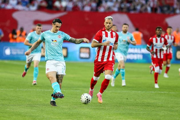 Red Star Belgrade v Larne - UEFA Champions League Qualifying BELGRADE, SERBIA - JULY 29: Matt Ridley (L) of Larne in action against Marko Arnautovic (R) of Red Star Belgrade during the Champions League second qualifying round second leg between Red Star Belgrade and Larne at Red Star Stadium in Belgrade, Serbia, on July 29, 2026. Filip Stevanovic Anadolu Belgrade Serbia. Editorial use only. Please get in touch for any other usage.  Copyright: x2026xAnadoluxFilipxStevanovicx