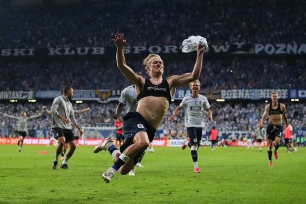 Tobias Bech of Aarhus GF celebrates after scoring the winning goal in the penalty shootout with teammates after qualifying for the UEFA Champions League Third Round Lech Poznan v Aarhus GF, UEFA Champions League Second Round Qualifier Second Leg, Football, Enea Stadion, Poznan, Poland, 29 07 2026 - 29 Jul 2026Poznan ENEA Stadion Poland  Copyright: xHanc WiredxPhotos Shutterstockx 17026455p