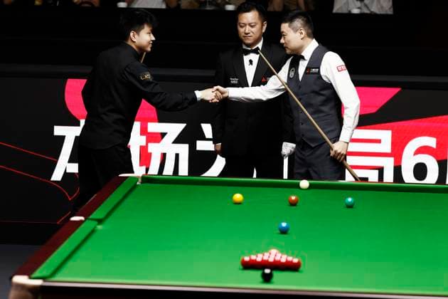 SHANGHAI, CHINA - JULY 29: Zhao Xintong of China shakes hands with Ding Junhui of China in the second round match on Day 3 of the 2026 Snooker Shanghai Masters at Luwan Gymnasium on July 29, 2026 in Shanghai, China.  Copyright: xChinaxNewsxServicex 111657199282