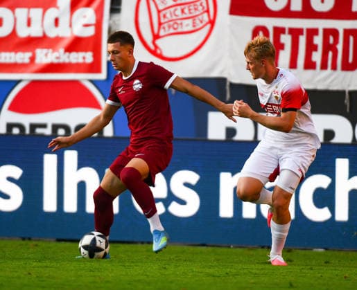 29.07.2026, xpsx, Fussball Testspiel, Kickers Offenbach - VfB Stuttgart v.l. Jan Becker (Offenbacher Kickers), Maximilian Herwerth (VfB Stuttgart) (DFL DFB REGULATIONS PROHIBIT ANY USE OF PHOTOGRAPHS as IMAGE SEQUENCES and or QUASI-VIDEO) emspor Offenbach *** July 29, 2026, xpsx, soccer exhibition match, Kickers Offenbach vs. VfB Stuttgart, Jan Becker (Offenbacher Kickers), Maximilian Herwerth (VfB Stuttgart). DFL and DFB regulations prohibit any use of photographs as image sequences and or quasi-video. emspor Offenbach