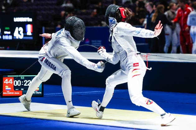 CHINA, HONG KONG - JULY 30, 2026: Athlete Anna Solovyova of Russia fights in her team foil bout against Maria Marino of Spain during the 2026 Kerry Fencing World Championships. Mikhail Sinitsyn TASS  95618918