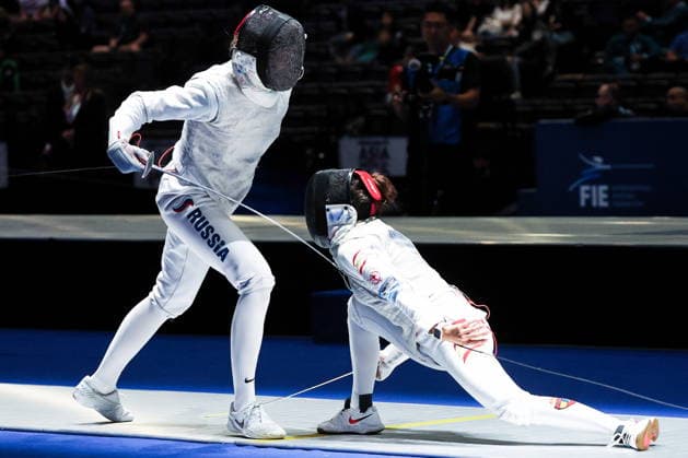 CHINA, HONG KONG - JULY 30, 2026: Athletes Anna Solovyova (L) of Russia and Maria Marino of Spain fight in their team foil bout during the 2026 Kerry Fencing World Championships 2026 Fencing World Championships In Hong Kong  - ZUMAt113 20260730_zaa_t113_031 Copyright: xMikhailxSinitsynx