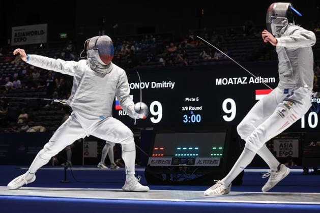 Sport Bilder des Tages CHINA, HONG KONG - JULY 30, 2026: Athletes Dmitry Nasonov (L) of Russia and Adham Moataz of Egypt fight in their team sabre bout during the 2026 Kerry Fencing World Championships 2026 Fencing World Championships In Hong Kong  - ZUMAt113 20260730_zaa_t113_044 Copyright: xMikhailxSinitsynx