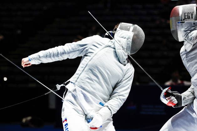 CHINA, HONG KONG - JULY 30, 2026: Athletes Dmitry Nasonov (L) of Russia and Adham Moataz of Egypt fight in their team sabre bout during the 2026 Kerry Fencing World Championships 2026 Fencing World Championships In Hong Kong  - ZUMAt113 20260730_zaa_t113_046 Copyright: xMikhailxSinitsynx