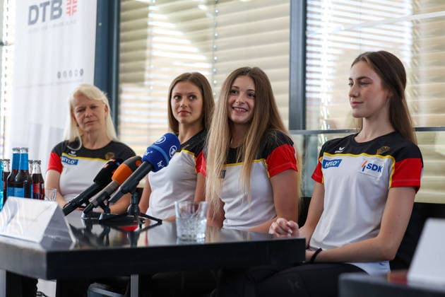 Frankfurt am Main, July 30, 2026: Isabell Sawade (RSG-Teamchefin und TK-Mitglied Weltturnverband), Anastasia Simakova (TSV Schmiden), Lada Pusch (TSV Schmiden), Darja Varfolomeev (TSV Schmiden) during a media day from Deutscher Turner-Bund (DTB) ahead of the Rhythmic gymnastics, Rhythmische Sportgymnastik, RSG World Championships at Festhalle Frankfurt (Aug. 12 16.2026) *** Frankfurt am Main, July 30, 2026 Isabell Sawade, RSG Team Manager and Technical Committee Member of the International Gymnastics Federation (DTB), Anastasia Simakova, TSV Schmiden; Lada Pusch, TSV Schmiden; Darja Varfolomeev, TSV Schmiden, during a media day hosted by the German Gymnastics Federation (DTB) ahead of the Rhythmic Gymnastics World Championships at the Festhalle Frankfurt, August 12–16, 2026 Copyright: HMBxMedia JoaquimxFerreira
