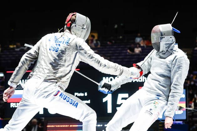 CHINA, HONG KONG - JULY 30, 2026: Athletes Dmitry Nasonov (L) of Russia and Adham Moataz of Egypt fight in their team sabre bout during the 2026 Kerry Fencing World Championships 2026 Fencing World Championships In Hong Kong  - ZUMAt113 20260730_zaa_t113_058 Copyright: xMikhailxSinitsynx