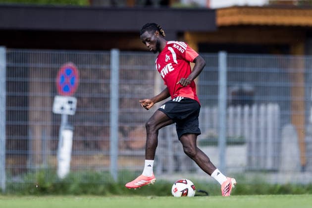 ST. JOHANN IN TIROL, AUSTRIA - JULY 30: Gideon Mensah (1. FC Koeln, 14) controls the ball during a training session at trainings camp in Kitzbuehel of season 2026 27 at Koasastadion on July 30, 2026 in St. Johann in Tirol, Austria. Austria Copyright: xSteffiexWunderlx