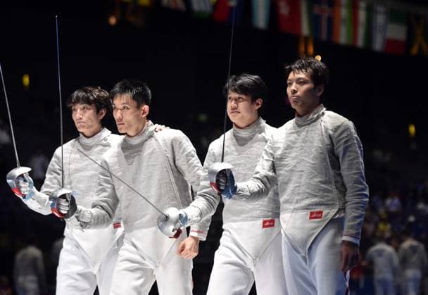(260730) -- HONG KONG, July 30, 2026 -- (from R to L) Shen Chenpeng, Wei Zhenhao, Luo Shaotong and Lin Xiao of China react ahead of the team men s sabre quarterfinal match between China and France at the 2026 Fencing World Championships in Hong Kong, south China, July 30, 2026. ) (SP)CHINA-HONG KONG-FENCING-WORLD CHAMPIONSHIPS-MEN S SABRE-TEAM (CN) LoxPingxFai 