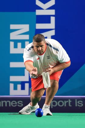 COM26 BOWLS, Chad Nathan of Tonga bowls as New Zealand play Tonga in the Bowls Men s Pairs Sectional, Section D, Round 2 of the Glasgow 2026 Commonwealth Games at SEC Centre Hall 3 in Glasgow, Scotland, Thursday, July 30, 2026. ( NO ARCHIVING, EDITORIAL USE ONLY, AUSTRALIA ONLY Glasgow Scotland United Kingdom  Copyright: xSIMONxSTACPOOLEx 20260731111112216853