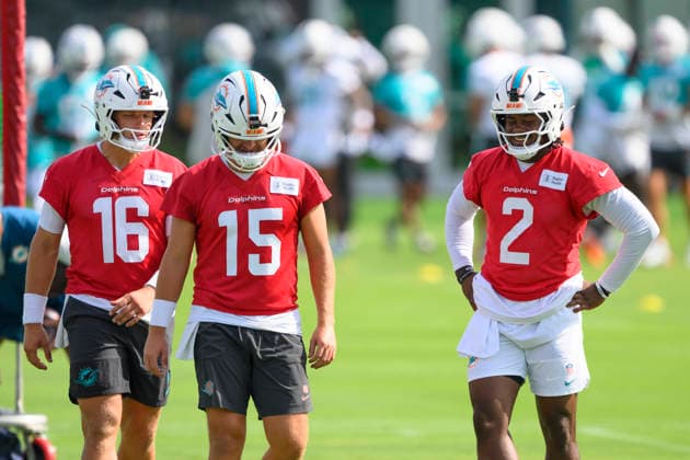 MIAMI GARDENS, FL - JULY 30: Miami Dolphins quarterback Malik Willis (2) smiles on the field with quarterbacks Mark Gronowski (16) and Cam Miller (15) during the Miami Dolphins Training Camp on July 30, 2026, at the Baptist Health Training Complex in Miami Gardens, FL. (Photo by Doug Murray Icon Sportswire) NFL, American Football Herren, USA JUL 30 Dolphins Training Camp EDITORIAL USE ONLY Icon796260730011
