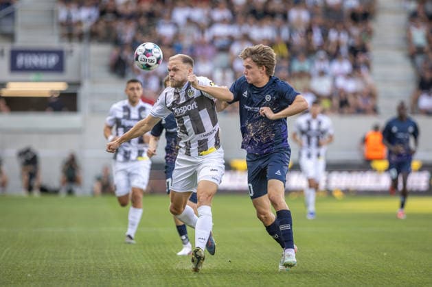 HRADEC KRALOVE - TROMSO Mick Van Buren of Hradec and Isaac Vadebu of Tromso during the second leg of second qualifying round of UEFA Europa league football match between FC Hradec Kralove and Tromso IL at the Malsovicka Arena Stadium. Hradec Kralove, Czechia, July 30, 2026. Photo by Branislav Racko Copyright: xx 080A7746