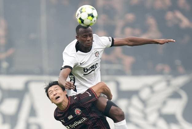 Midtjylland v Besiktas - UEFA Europa League HERNING, DENMARK - JULY 30: Midtjylland s Gue-Sung Cho (L) challenges for the ball with Besiktas Tiago Djalo during the UEFA Europa League second qualifying round second-leg match between Midtjylland and Besiktas at MCH Arena in Herning, Denmark, on July 30, 2026. Arife Karakum Anadolu Herning Denmark. Editorial use only. Please get in touch for any other usage.  Copyright: x2026xAnadoluxArifexKarakumx