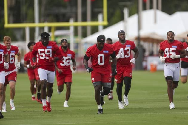 July 30, 2026, Tampa, Florida, USA: The Tampa Bay Buccaneers get in line for warm ups at training camp. Florida News - July 30, 2026  - ZUMAp_bu 0863058081st Copyright: xHannahxWallsx