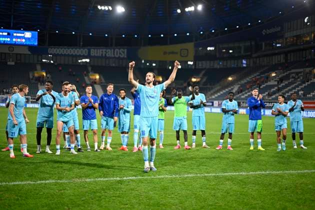 KAA Gent v LNZ Cherkasy - UEFA Conference League GENT, BELGIUM - JULY 30 : Players of KAA Gent and Burgess Christian defender of KAA Gent celebrates the victory towards the supporters after the UEFA Conference League 2026 27 second qualifying round second leg between KAA Gent and LNZ Cherkasy on July 30, 2026 in Gent, Belgium, 30 07 2026 Gent Belgium  Copyright: xNicoxVereeckenx
