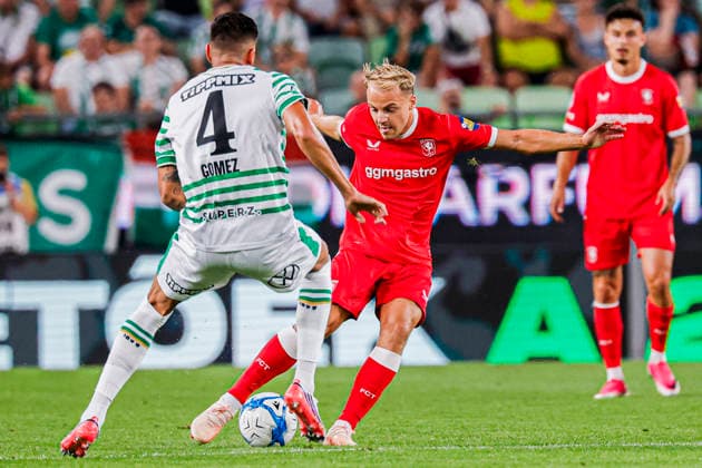 BUDAPEST, HUNGARY - JULY 30: Thomas van den Belt of FC Twente battles for possession with Mariano Gomez of Ferencvaros during the UEFA Europa League 2026 27 Second Qualifying Round Second Leg match between Ferencvaros and FC Twente at Groupama Arena on July 30, 2026 in Budapest, Hungary.  Copyright: xMTB-Photo MB-Mediax