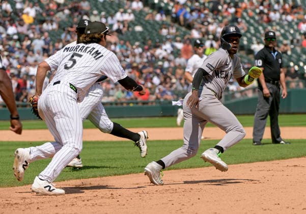 New York Yankees Jazz Chisholm Jr. (13) gets caught in a rundown between 1st and 2nd during the seventh inning at Rate Field in Chicago, IL on Thursday, July 30, 2026. The White Sox defeated the Yankees 2-1.  CHI20260730121 MARKxBLACK