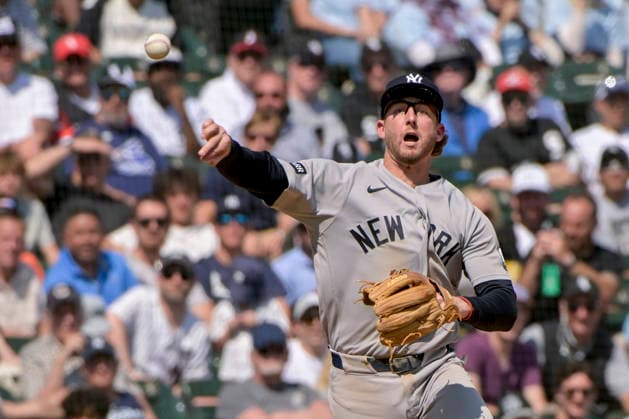 New York Yankees third baseman Ryan McMahon (19) makes the throw to first for the out on Chicago White Sox Luisangel Acuna during the seventh inning at Rate Field in Chicago, IL on Thursday, July 30, 2026.  CHI20260730123 MARKxBLACK