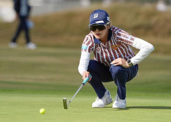Golf: Women s British Open Shiho Kuwaki of Japan lines up a putt during the first round of the Women s British Open golf tournament on July 30, 2026, at Royal Lytham &amp; St Annes Golf Club in Lytham St Annes, England.  A14AA0005624670P