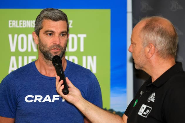 HANDBALL - HBL, Kiel, training camp GRAZ,AUSTRIA,31.JUL.26 - HANDBALL - HBL Handball-Bundesliga, THW Kiel, press conference, PK, Pressekonferenz Image shows head coach Benjamin Teras (BT Fuechse) and press officer Christian Robohm (Kiel).  GEPAxpictures xMarioxBuehner-Weinrauch