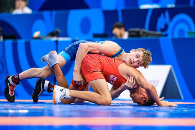 U17, U 17 Wrestling World Championships 48kg FS - Kooper Joshua Deputy (USA) df. Bogdan Sapojnic (GER) *** U17 Wrestling World Championships, 48 kg Freestyle: Kooper Joshua Deputy (USA) defeated Bogdan Sapojnic (GER) Copyright: xUnitedxWorldxWrestlingx xAmirrezx UWW-U17-WC-BAKU-2026