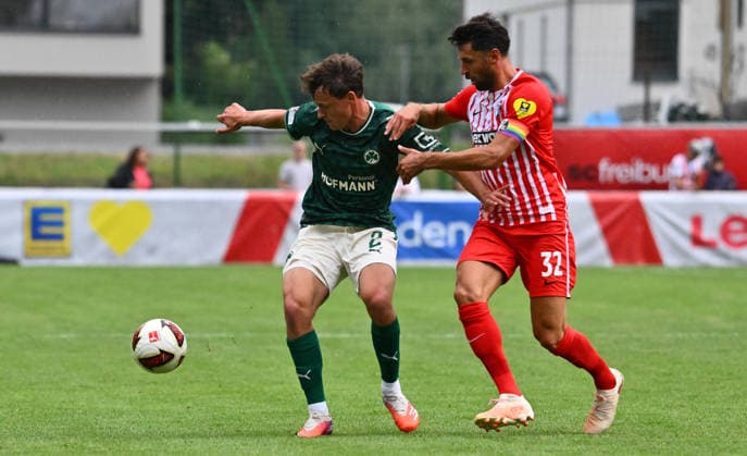 31.07.2026 - Fussball - Saison 2026 2027 - Testspiel Freundschaftsspiel Vorbereitungsspiel - SC Freiburg - SpVgg Greuther Fürth ( Kleeblatt ) - - Sportfoto Zink - xwoxzix - regulations prohibit any use of photographs as image sequences and or quasi-video - only for editorial use - Lukas Reich (2, SpVgg Greuther Fürth ) Vincenzo Grifo (32, SC Freiburg ) *** July 31, 2026 Soccer Season 2026–2027 Exhibition Match Friendly Match Preseason Match SC Freiburg SpVgg Greuther Fürth Kleeblatt Sports Photo Zink xwoxzix Regulations prohibit any use of photographs as image sequences and or quasi-video; for editorial use only. Lukas Reich 2, SpVgg Greuther Fürth Vincenzo Grifo 32, SC Freiburg