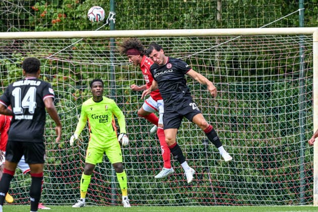 260731 Standard de Liege vs Arminia Bielefeld Marlon Fossey (13) of Standard CL and Stefano Russo (21) of Arminia Bielefeld during a friendly soccer game in the preparations ahead of the Jupiler Pro League season 2026 - 2027 between Standard de Liege and Arminia Bielefeld from Germany on July 31 , 2026 in Liege, Belgium. (Photo by Stijn Audooren Isosport) Liege SL16 Football Campus Liege Belgium  Copyright: xIsosportxStijnxAudoorenx