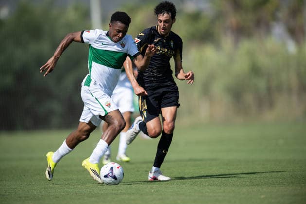Buba Sangare of Elche and Adnane Ghailan of Cordoba during preseason friendly match between Elche CF v Cordoba CF played at Oliva, Valencia on July 31, 2026 in Spain Oliva Valenci Spain *** Buba Sangare of Elche and Adnane Ghailan of Córdoba during a preseason friendly match between Elche CF and Córdoba CF played in Oliva, Valencia, on July 31, 2026, in Spain (Oliva, Valencia, Spain) Copyright: xVicentexVidalx xAgenciaxLOFx