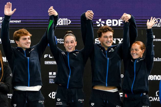 Chiara Pellacani, Matteo Santoro, Sarah Jodoin Di Maria, Raffaele Pelligra of Italy celebrate after winning the gold medal in the diving Team Event Mixed Final during the European Aquatics Championships at the Olympic Aquatic Center in Paris (France), July 31, 2026. Andrea Staccioli