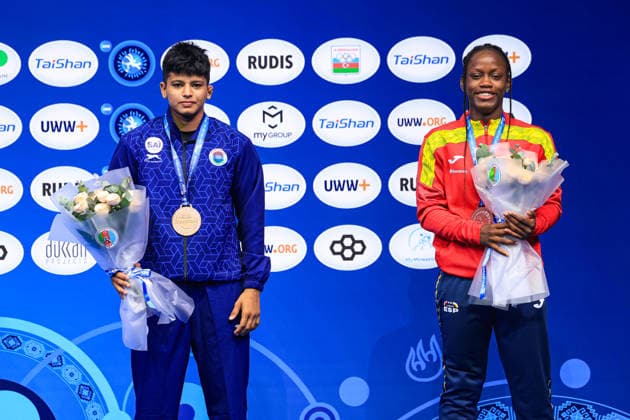 U17, U 17 Wrestling World Championships Podium 61kg WW - Bronze: Graciela Gaudencia Eningo Asama (ESP), Avanshika Avanshika (IND) *** U17 Wrestling World Championships, 61kg WW Bronze Medalists: Graciela Gaudencia Eningo Asama (ESP), Avanshika Avanshika (IND) Copyright: xUnitedxWorldxWrestlingx xAmirrezx UWW-U17-WC-BAKU-2026