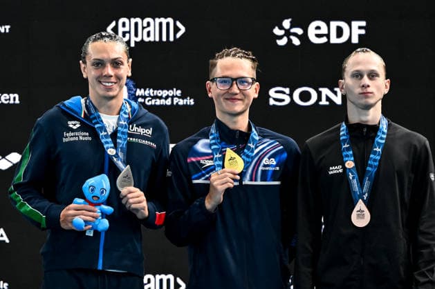 Filippo Pelati of Italy, silver, Ranjuo Tomblin of Great Britain, gold, Zakhar Trofimov Neutral Athlete B, bronze attend the medal ceremony of the artistic swimming Solo Tech Men Final during the European Aquatics Championships at the Olympic Aquatic Center in Paris (France), July 31, 2026. Andrea Masini Deepbluemedia Insidefoto