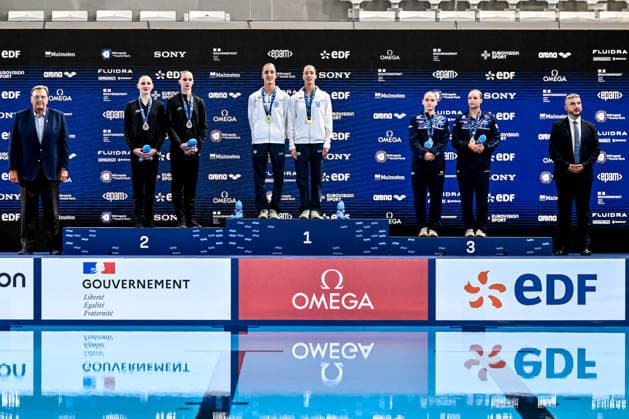 Maiia Doroshko and Aleksandra Shmidt Neutral Athletes B, silver, Anna Maria Alexandri and Eirini Marina Alexandri of Greece, gold, Kate Shortman and Isabelle Thorpe of Great Britain, bronze attend the medal ceremony of the artistic swimming Duet Tech Final during the European Aquatics Championships at the Olympic Aquatic Center in Paris (France), July 31, 2026. Andrea Masini Deepbluemedia Insidefoto