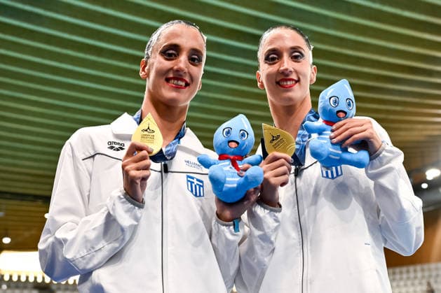 Anna Maria Alexandri and Eirini Marina Alexandri of Greece show the gold medal after competing in the artistic swimming Duet Tech Final during the European Aquatics Championships at the Olympic Aquatic Center in Paris (France), July 31, 2026. Andrea Staccioli Deepbluemedia Insidefoto