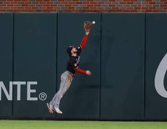 Right fielder Dylan Crews 3 of the Washington Nationals can t come up with a ball hit off the wall by first baseman Matt Olson 28 of the Atlanta Braves (not pictured) in the sixth inning at Truist Park on Friday, July 31, 2026 in Atlanta, Georgia.  ATL20260731118 MikexZarrilli